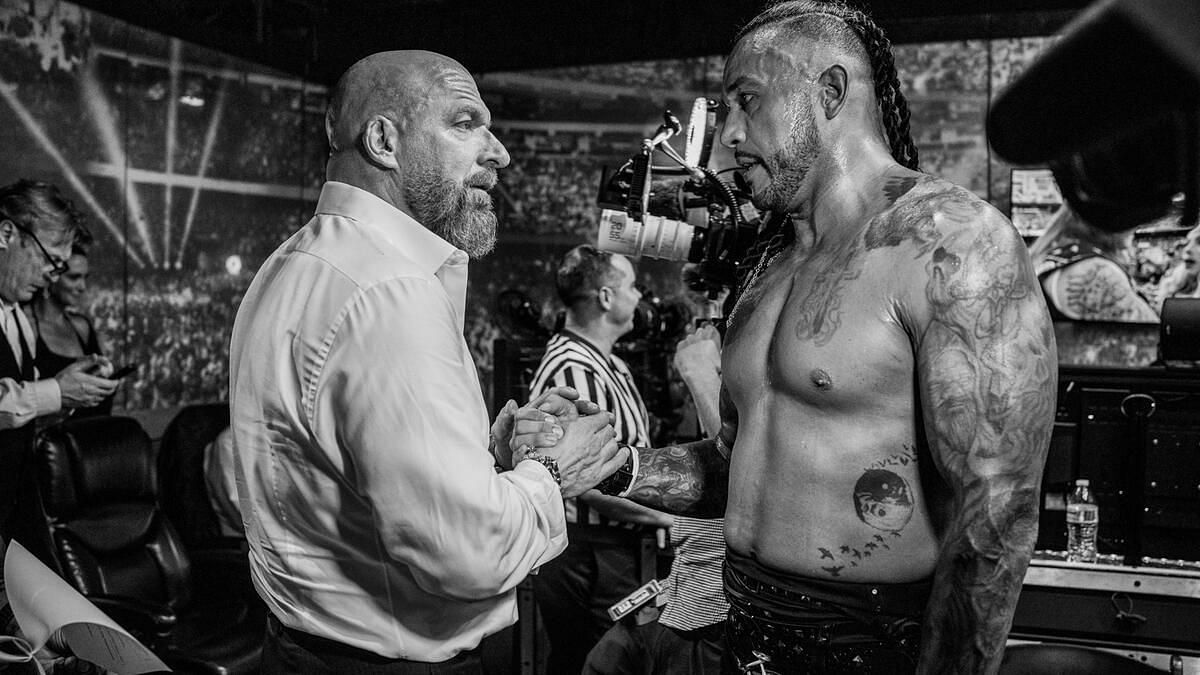 Damian Priest and Triple H